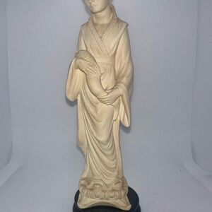 Elegant Cream Figurine